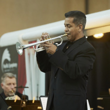 A member of Pacific Symphony on the Go! performs during Summer at Soka