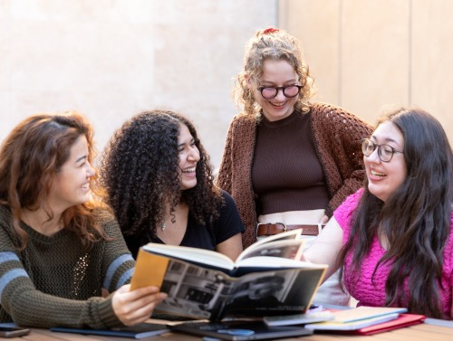 Four students studying humanities